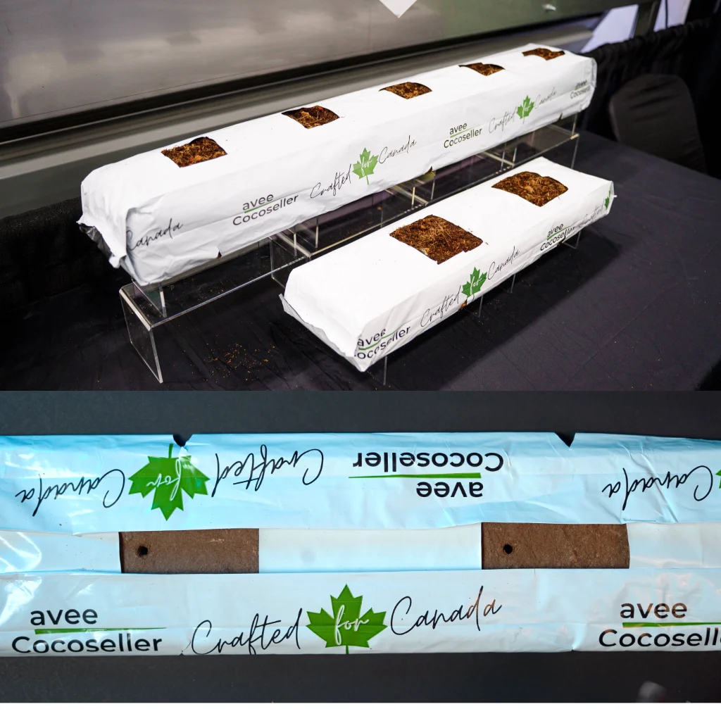 Avee Cocoseller premium coco coir grow bags featuring "Crafted for Canada" packaging and a green maple leaf, displayed on a stand for greenhouse hydroponics.