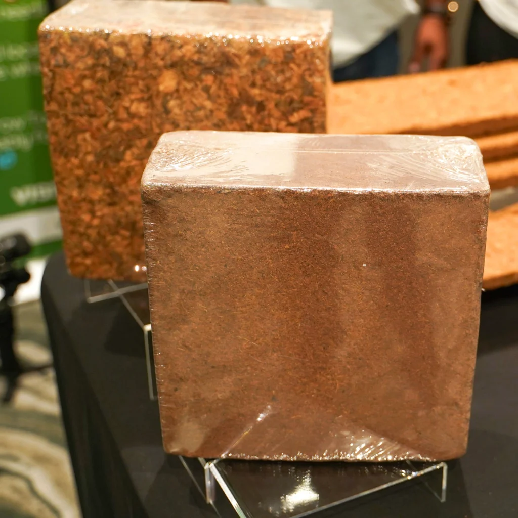 Wrapped block of compressed coco husk chips, a sustainable growing medium for Canadian gardeners.